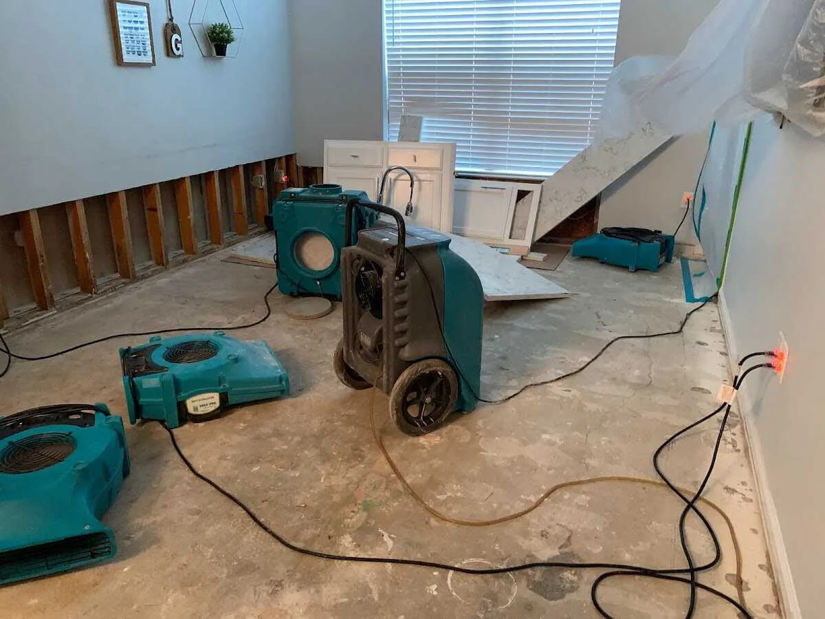Dehumidifier in flood-cut room for Water Damage Restoration in Angola